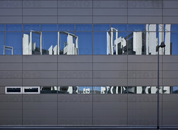 Residential development on Via Traiano, built in 2009-2014 by Guido Canali, reflection in the