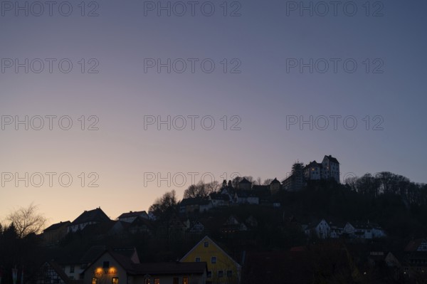 Evening silhouette of Egloffstein with its historic castle, Egloffstein, Upper Franconia, Bavaria,