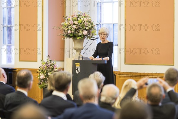 Friede Springer gives a speech of thanks after being awarded honorary citizenship at the Rotes