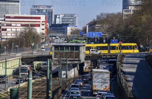 Motorway A40, Ruhr expressway, heavy traffic jam, rush hour, city passage in Essen, skyline of the