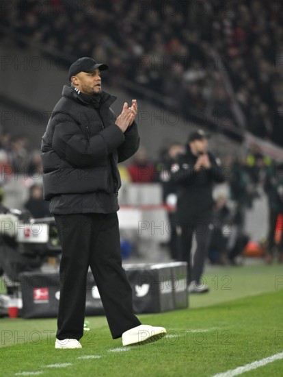 Coach Vincent Kompany FC Bayern Munich FCB on the sidelines clapping his hands in encouragement,