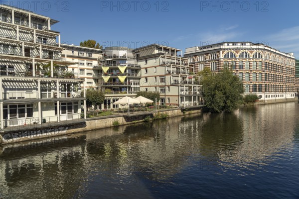 Elster Lofts residential building and the Weiße Elster river in Leipzig, Saxony, Germany, Europe