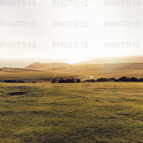 Coastline with view towards Belle Tout, backlight, sunbeam, text free space, Eastbourne, South
