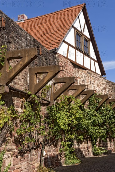 Reconstructed brackets made of concrete, support for battlements on town wall from the Middle Ages,
