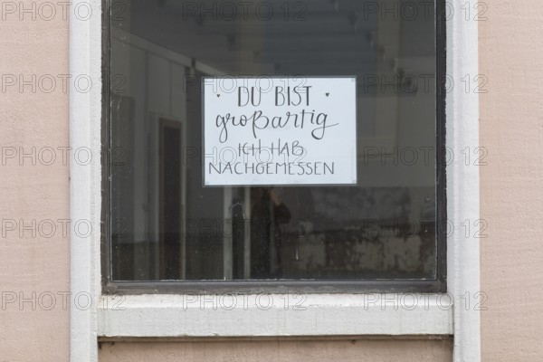 Note with inscription in a shop window, You are great, I have measured, Sebnitz, Saxony, Germany,