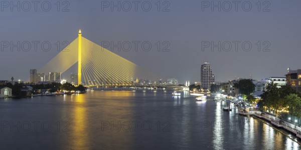 The illuminated Rama VIII Bridge over the Mae Nam Chao Praya, Bangkok, Thailand, Asia