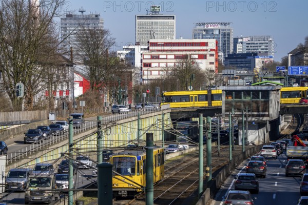 Motorway A40, Ruhr expressway, heavy traffic jam, rush hour, city passage in Essen, skyline of the
