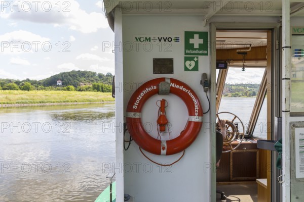 On the Stolzenfels ferry on the Elbe from Niederlommatzsch to Diesbar-Seußlitz, Saxony, Germany,