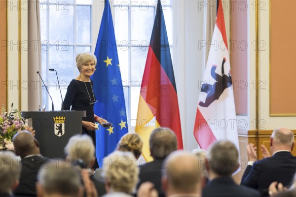 Friede Springer gives a speech of thanks after being awarded honorary citizenship at the Rotes
