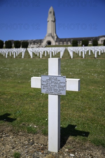 Cemetery of soldiers killed in the First World War, in the background the ossuary of Douaumont,
