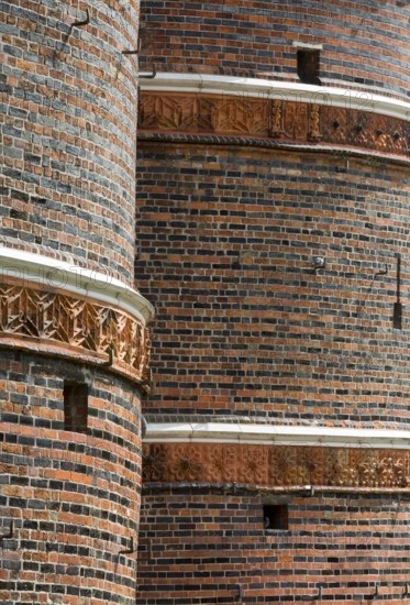 Field side with terracotta decoration