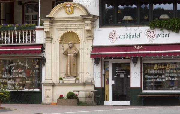 Souvenir shops and statue of St Francis, St, Saint, Saint