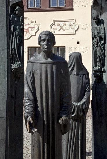 On the market square, 1989 by Klaus Messerschmidt Detail, quotes from Stolberg carved sculpture on