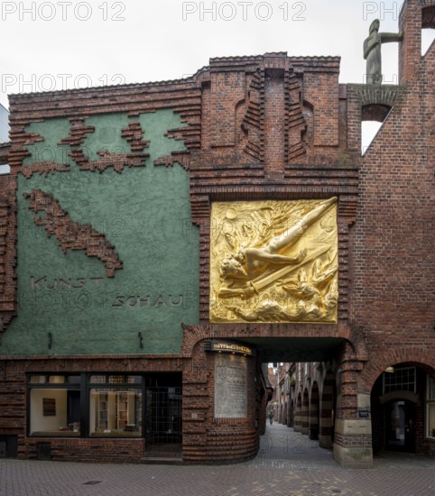 Bremen, entrance to Böttcherstraße, with the façade relief The Lightbringer by Bernhard Hoetger