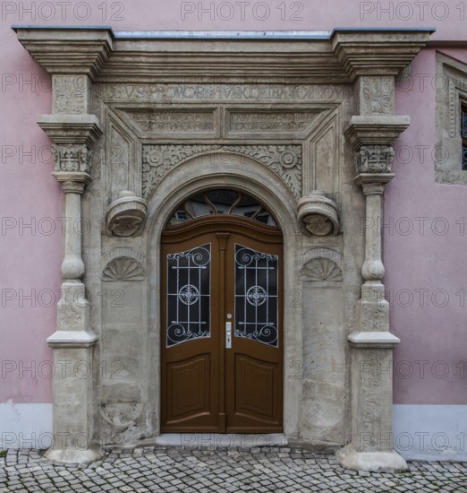 Freyburg Unstrut. House at Markt 14, Renaissance seating niche portal inscription dated 1554