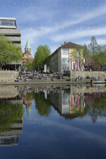 Sunbathing on the banks of the Neckar, relaxing, chilling, spring, Heilbronn, Neckar valley,