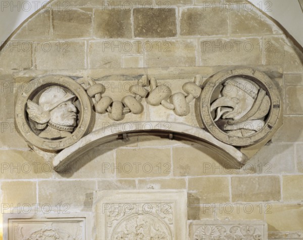 Stone medallions from the tower superstructure, on the right monk with forked tongue, St., Sankt,