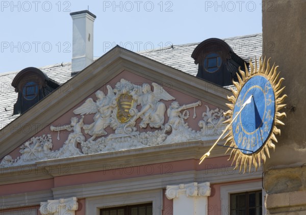 Castle courtyard, sundial and baroque pediment