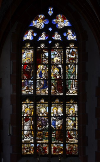 Renaissance window from 1535 on the end wall of the north aisle: Three Magi, with the founder