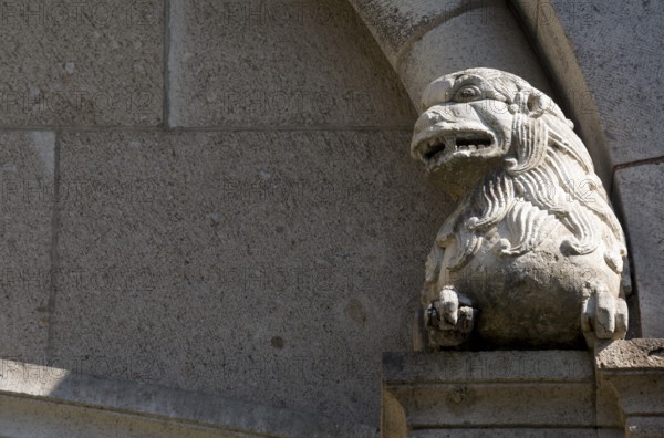 Romanesque lion, Saint, Saint