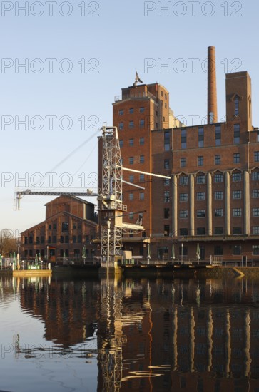 View of the south side, Werhahn mill with grain crane