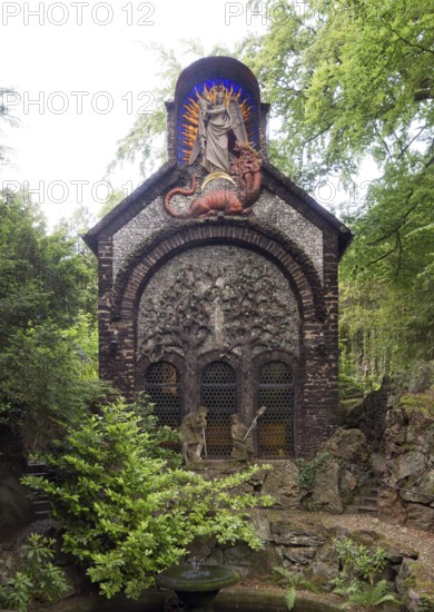 Garden of Redemption, chapel with the theme of redemption from evil, gable field with two trees of