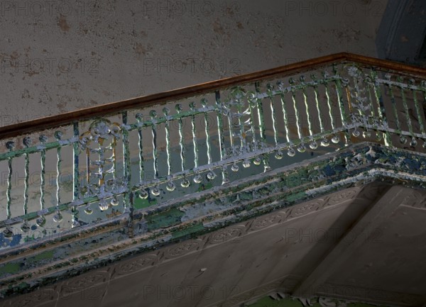 Pavilion for men, staircase railing detail with peeling paint