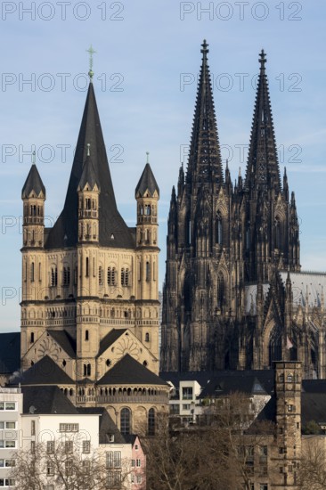 Cologne, Groß St. Martin, behind it the cathedral, view from the Severinsbrücke bridge