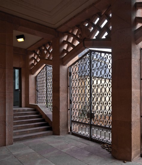 Built in 1925-29, passageway in the east wing with a view of the Old St John's Cemetery