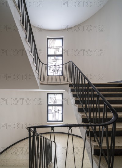 Krefeld, Ürdingen, Meistermann House, former Protestant parish hall. Staircase with glass window by