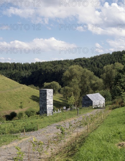 Sculpture garden in Merscheid. The bunker village of Gölm by Uwe Schloen. Tower from 2008