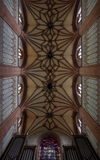 Former Cistercian church, central nave vault, western part, organ and west window cut at the