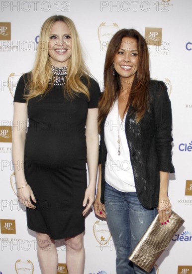 SANTA MONICA, CA - MARCH 29, 2012: Rosie Pope and Brooke Burke at the Rosie Pope Maternity Store