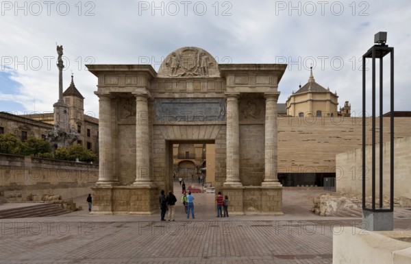 Cordoba, Puerta del Puente. Field side left Triumphal column of St Rafael right Dome of the mosque