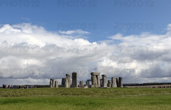Stonehenge, prehistoric stone circle with tourists