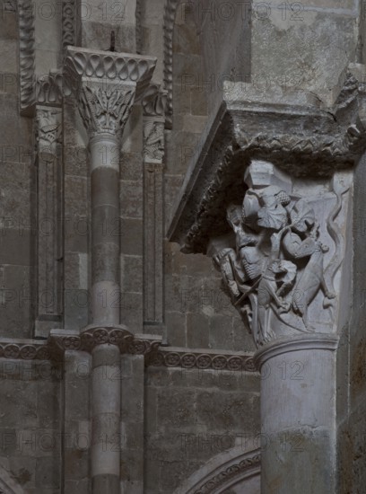 Vezelay, Basilica of Ste-Marie-Madeleine. Interior. South aisle figure capital. Left half-column on