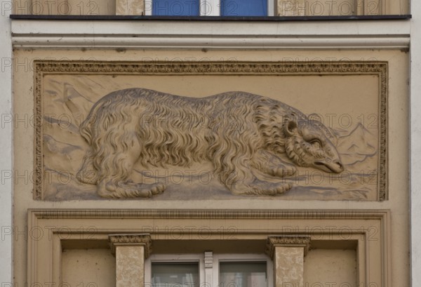 Stucco relief of a bear, relief possibly early modern, façade ca. mid-19th cent