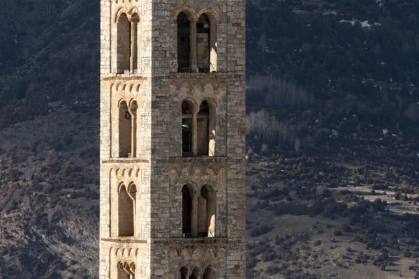 Taüll, Sant Climent, bell tower against the mountain backdrop