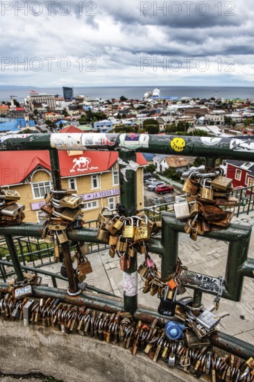 Love locks on a fence, viewpoint over Punta Arenas, Patagonia, Chile, South America