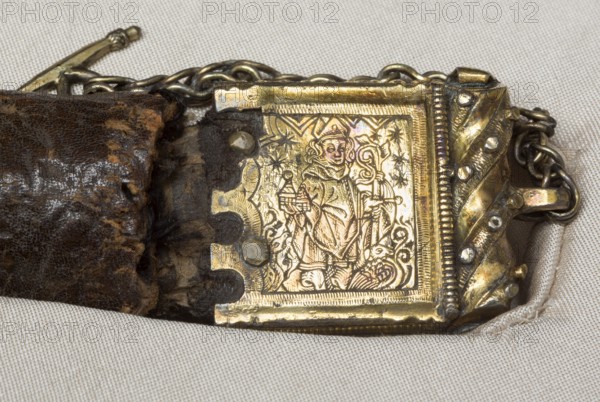 Belt of St Liudger, silver buckle with relief of St Liudger in episcopal regalia with a model of a