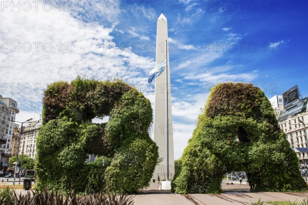 Plant gates in the shape of the letters of Buenos Aires, in front of the obelisk, Avenida 9 de