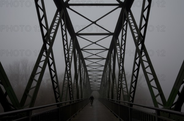 With cyclist in the fog. Karl Meseberg, chief sailor and communist, drove the November Revolution
