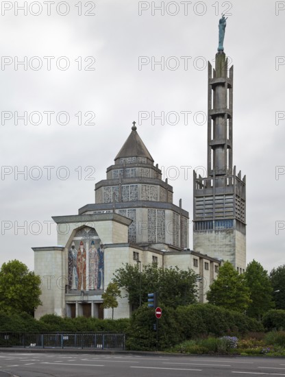 1957-61 by Paul Tournon, modelled on the Vatican pavilion at the 1937 World Exhibition in Paris,