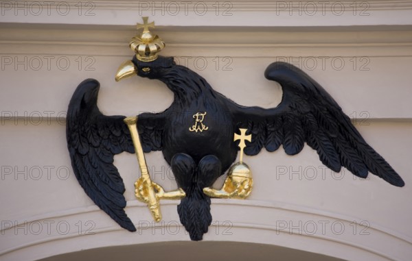 Heraldic animal with crown, sceptre and orb