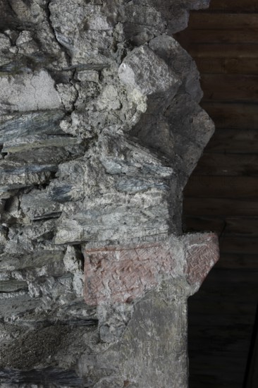 Above the choir vault, wall above the choir arch, remnant of a Romanesque window Church of St.,