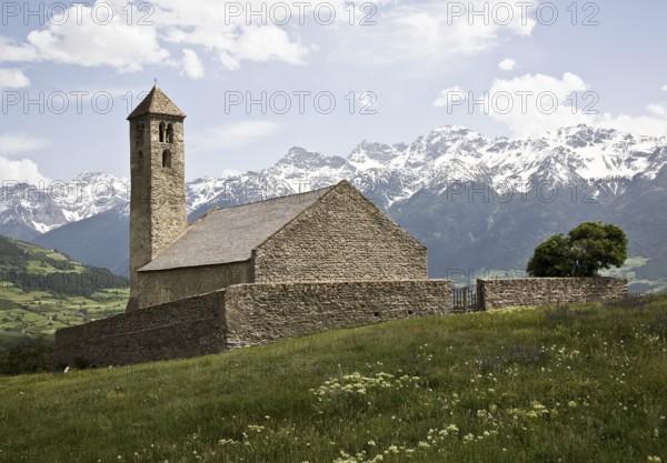 Italy S-Tyrol Tartsch St Veit on the Tartscher Bühel v NW. On the Bühel there is a Romanesque