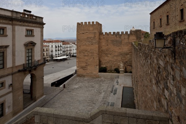 Town hall on the left and remains of the Moorish city wall in the centre