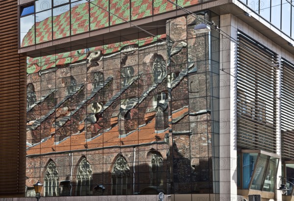Reflection of the south side of the nave in a modern neighbouring building, St., Sankt, Saint