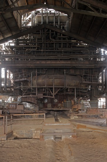 Former Thyssen AG steelworks, tapping hall at blast furnace 5 with tapping hole, drilling machine