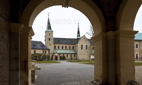 Monastery church seen from the south through the gatehouse, St., Sankt, Saint